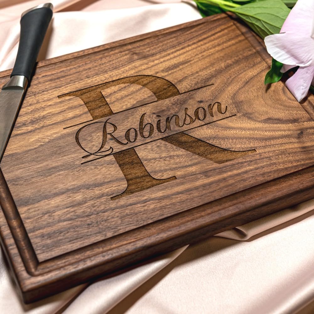 Elegant walnut custom cutting boards with engraved initials, a timeless addition to any kitchen or as a thoughtful gift